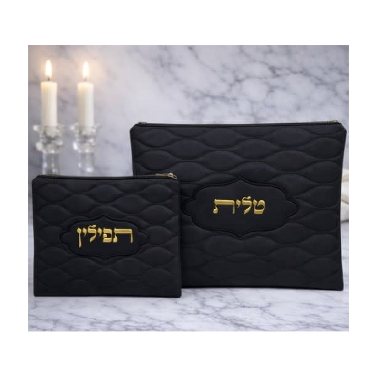 Tallit and tefillin cover, black vinyl with puffed-up gold letters.